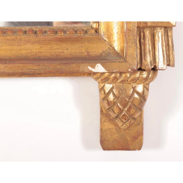 French Vintage Italian Made Louis XVI Style Carved Giltwood Mirror With Elaborate Floral Crest For Sale - Image 3 of 7