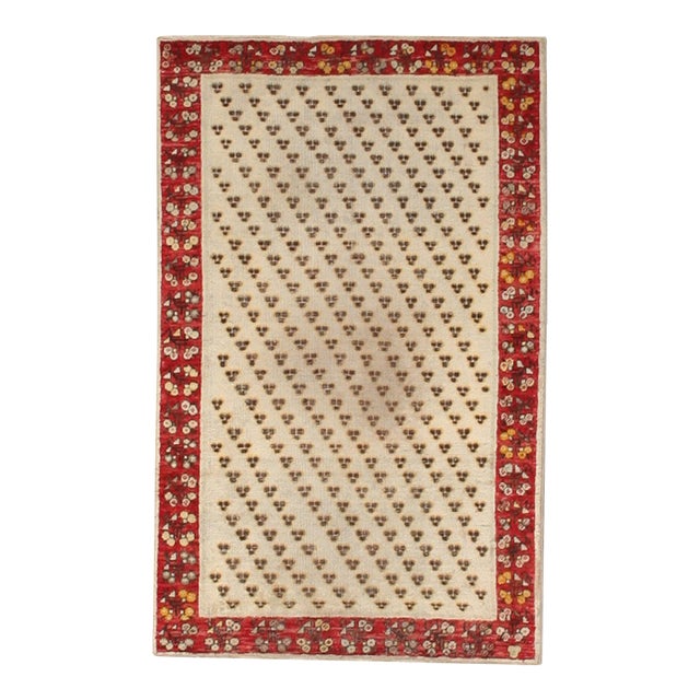 Wool Late 19th Century Handmade Ivory Field Red Turkish Ghiordes Scatter Rug - 3' x 4'8" For Sale
