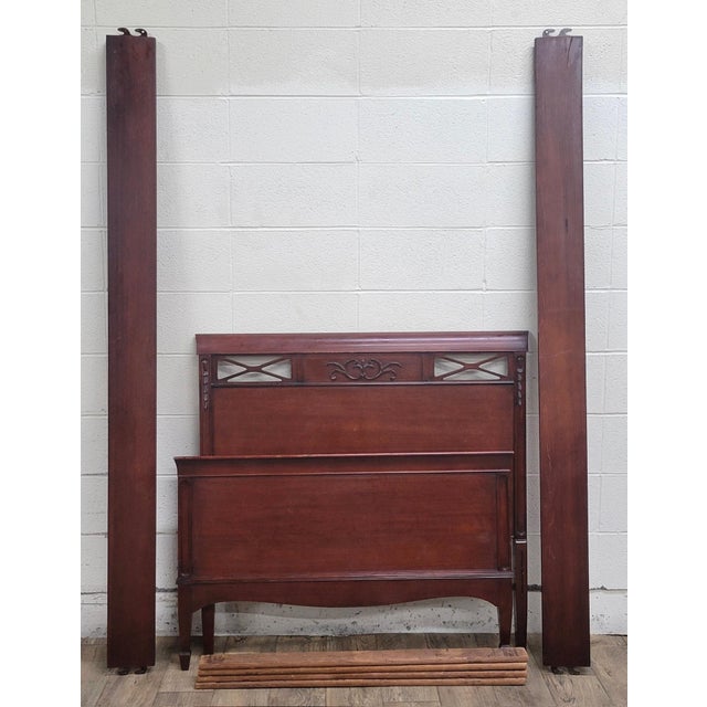 This is an absolutely stunning vintage cherry twin sleigh bed. It features a beautifully carved headboard, carved sides,...