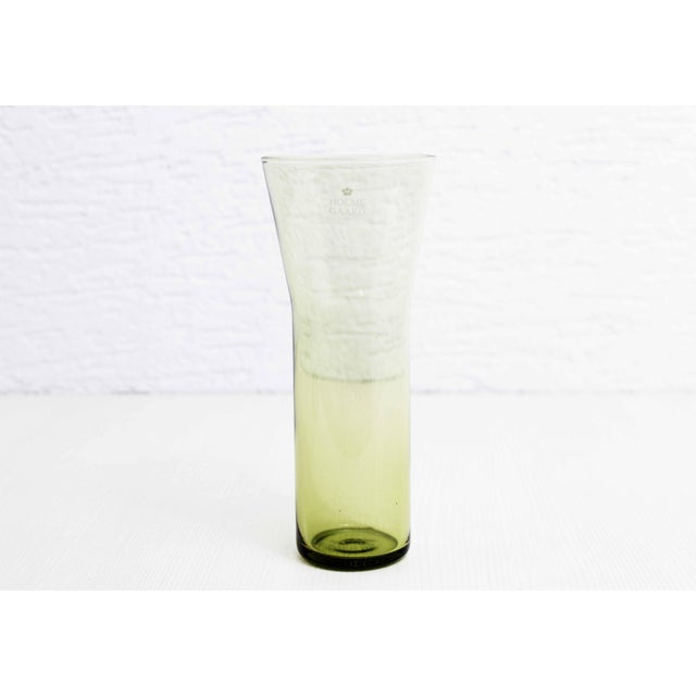 Vintage Holmegaard yellow glass vase We never get tired of Scandinavian design! Minimalist and so effective, this pretty...