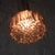 Vintage ceiling lamp with a chromed metal bracket, a slightly smoked bubble glass shade, and an extra-long fabric cable....