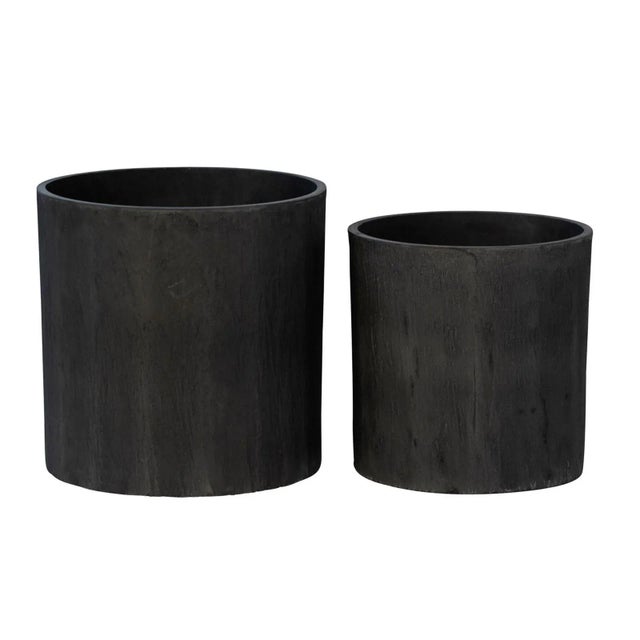 Modern outdoor planter with the look of modern cement without the weight. Easy to use and move light weight resin...