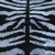 "Bold yet sophisticated, this handmade silk velvet throw pillow reinterprets the timeless beauty of zebra-inspired motifs...