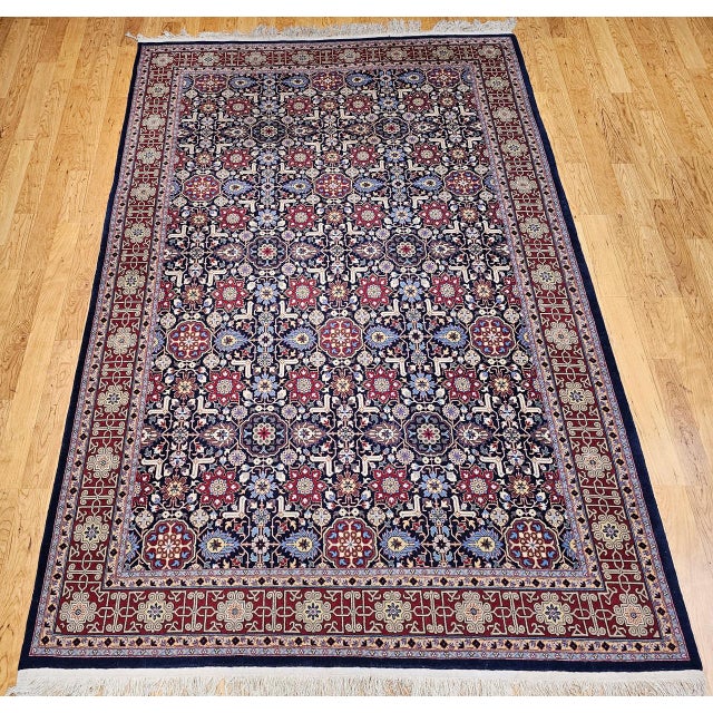"This remarkable vintage Persian Tabriz rug features a rare and highly sought-after allover geometric Caucasian Kuba...