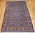 "This remarkable vintage Persian Tabriz rug features a rare and highly sought-after allover geometric Caucasian Kuba...