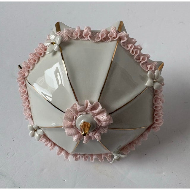 Absolutely stunning Capodimonte porcelain petite decorative parasol. The intricate pink detail around the rim of the...
