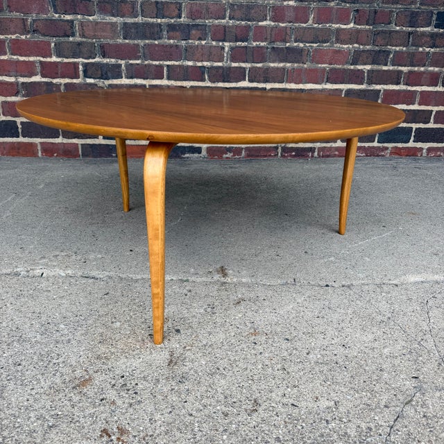 A striking early “Annika” coffee table by renowned Swedish designer Bruno Mathsson, displaying the refined organic lines...