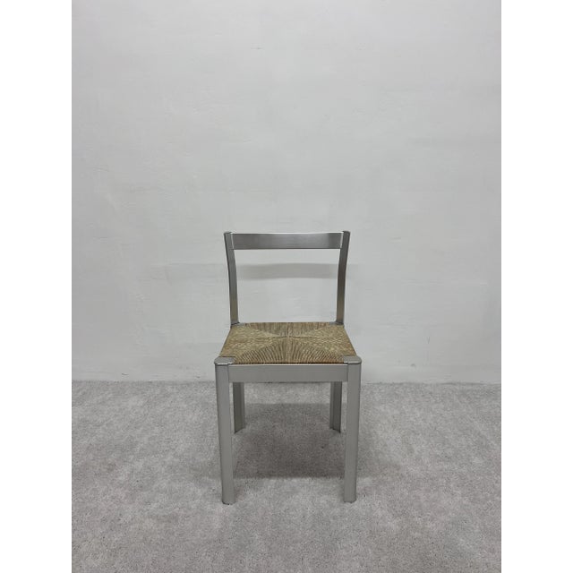 Italian organic modern dining or side chair with anodized aluminum frame and cord seat, 1980s.