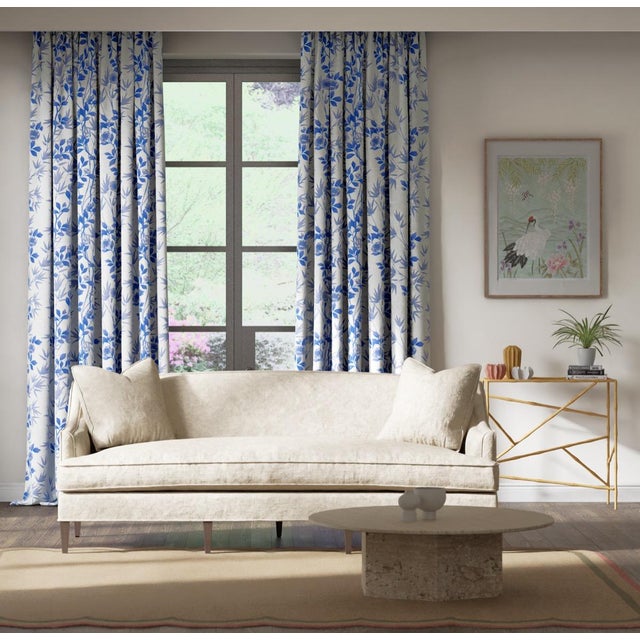 Featuring bamboo stems entwined with delicate anemone blooms this classically inspired design is closely related to its...