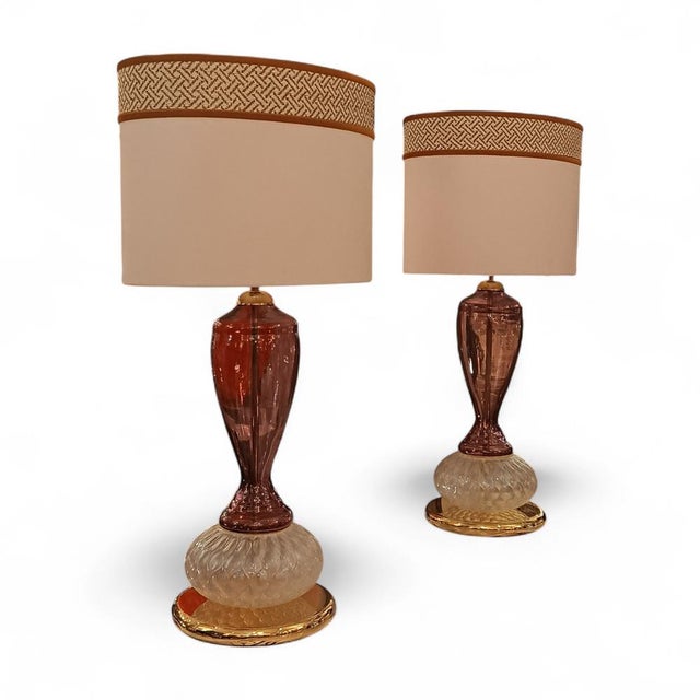 A magnificent pair of table lamps, handcrafted by Venetian masters in Murano. Each lamp features an oval-shaped opalescent...