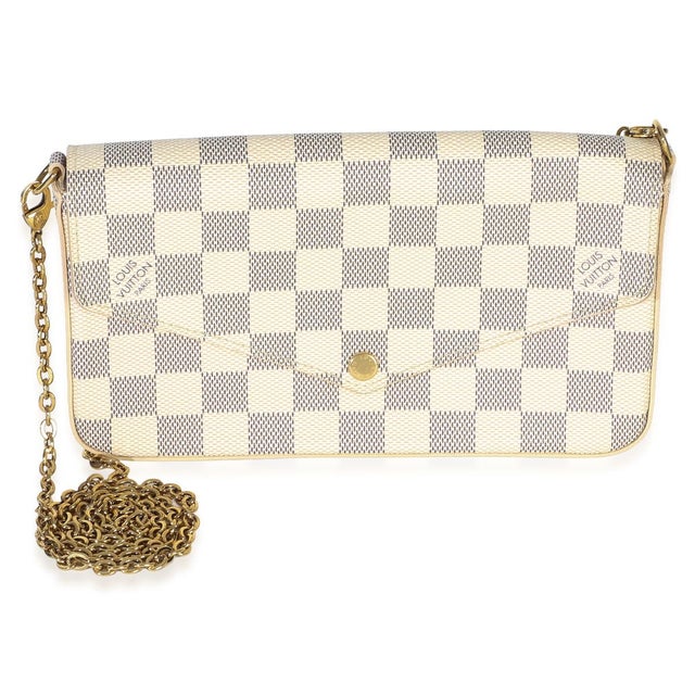 Item #: 153654 Features Interior: Two slip pockets. One zip pocket. Eight card slots Dimensions: 8.5 x 4.75 x 1 in Handbag...