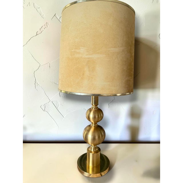 Elegant vintage table lamp by Boulanger, France, dating from the 1970s. This refined piece features a sculptural brushed...