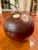 A handsome and unique object to add interest to your home. Solid mahogany ball with an inlaid number two. Origin is...