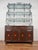 Maitland Smith Neoclassical Leather Wrapped Base Ornate Ironwork Baker’s Rack Dimensions: 81.25”h 46.25”w x 18.25”d Bottom...