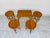 A stunning set of scandinavian-inspired nesting tables, comprising a rectangular main table and four round side tables...