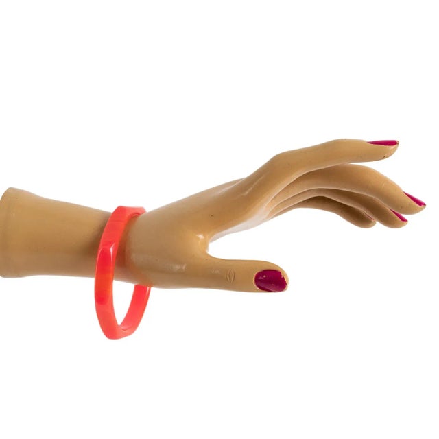 This is part of Chairish’s Costume Jewelry assortment. This gorgeous pink marble Bakelite bracelet bangle has a chunky...