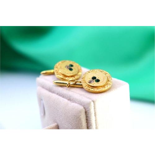 Circular gold cufflinks, surrounding strips and coloured stones. Metal: Gold. Origin: Portuguese. Brand: Tigre II Title....