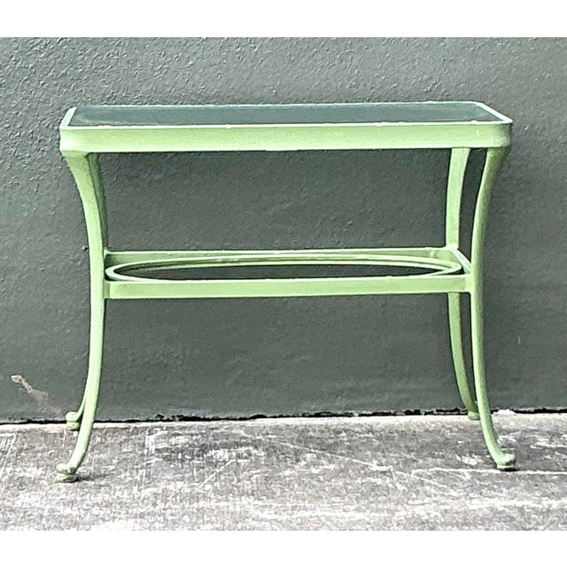 This elegant vintage side table from Brown Jordan’s iconic "Florentine" collection is a masterclass in mid-century outdoor...