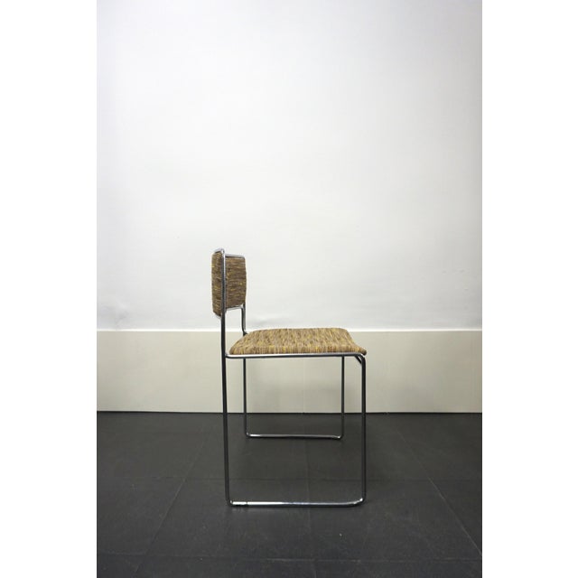 Set of 4 Italian dining chairs designed by Vittorio Introni for Saporiti Italia. A very slender yet striking and...