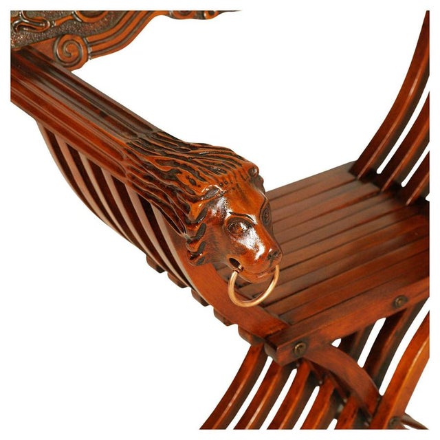 Carved Wooden Savonarola Chair, 1890s, in Very Good conditions. Designed 1890 to 1919 This piece has an attribution mark,...