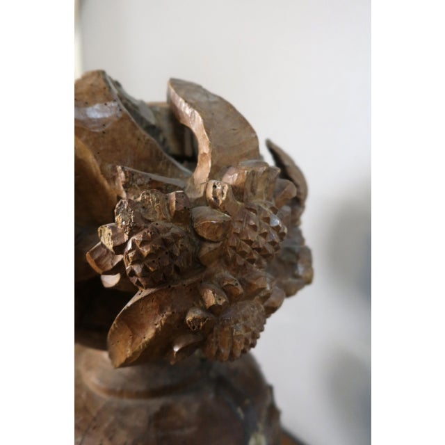 Pair of large carved walnut fire pots from the late 18th century. There are a few minor losses, but they are very...