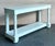 Discover the architectural elegance of the "Spotswood" console table by McKinnon and Harris, a paramount example of...