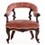 exhibiting elegant mid-nineteenth-century craftsmanship and refined proportions. The chair features an upholstered crest...