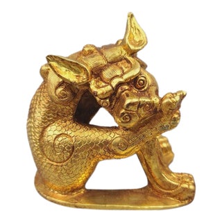 Gilt Bronze Qilin Paperweight – 3.9" Mythical Beast Sculpture With Scale Detail For Sale