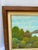 An original acrylic on canvas amateur style painting of a pheasant flying over an outdoor landscape. Finished with a wood...