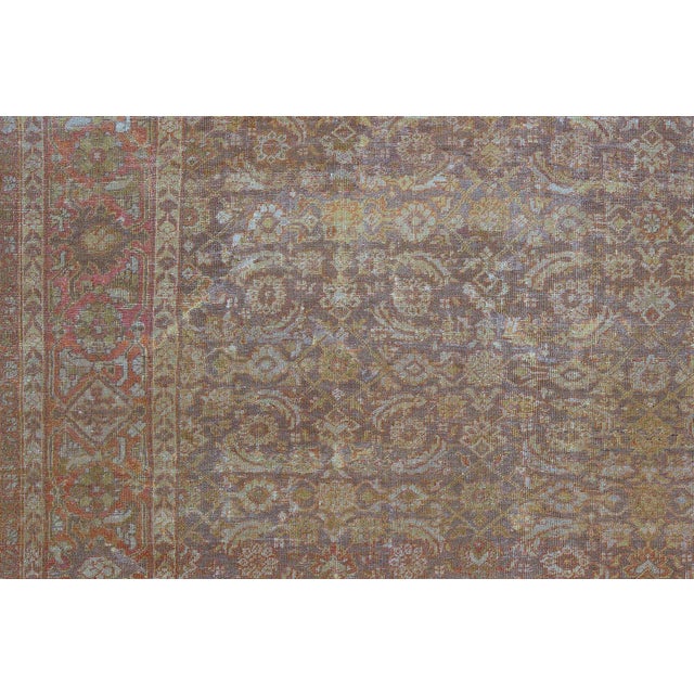 An early 20th Century Oversize Persian Mahal Square with an all-over traditional Herati pattern on a brown field....