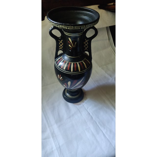 Hand-painted clay neoclassical Greek vase. Different paintings on either side