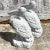 Vintage Coastal Painted Cast Concrete Pelicans - A Pair For Sale - Image 4 of 8