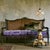 A striking statement accent table that bridges classical architectural motifs with modern industrial utility. Featuring a...
