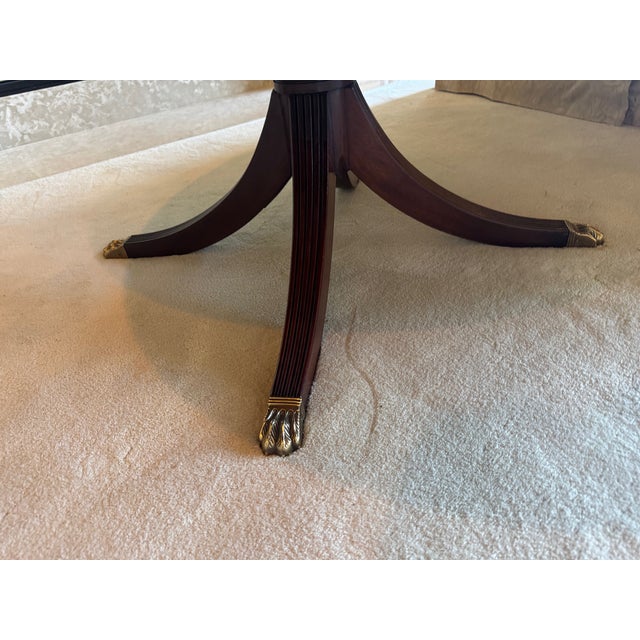 A beautifully proportioned round coffee table by Henkel Harris, showcasing the brand’s signature commitment to traditional...