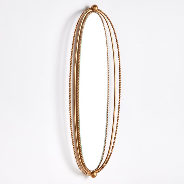 With a triple braided detail, this chic narrow mirror is perfect for powder room or small entryway. Hang in multiples &...