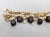 Vintage 1960s Signed Napier Goldtone Faux-Topaz & Mother of Pearl Charm Bracelet For Sale - Image 10 of 14