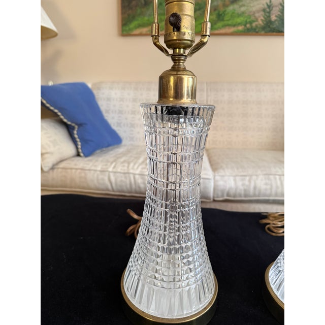 A magnificent pair of Waterford Crystal lamps in the traditional Longford design. This classic design features deep cuts...