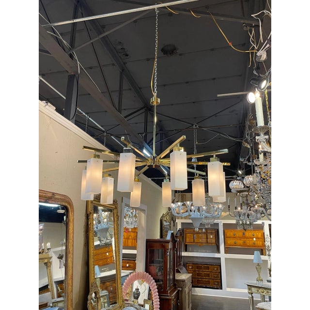 Large scale modern Murano square shaped glass on a polished brass base with 10 lights. Creates a very sculptural look....