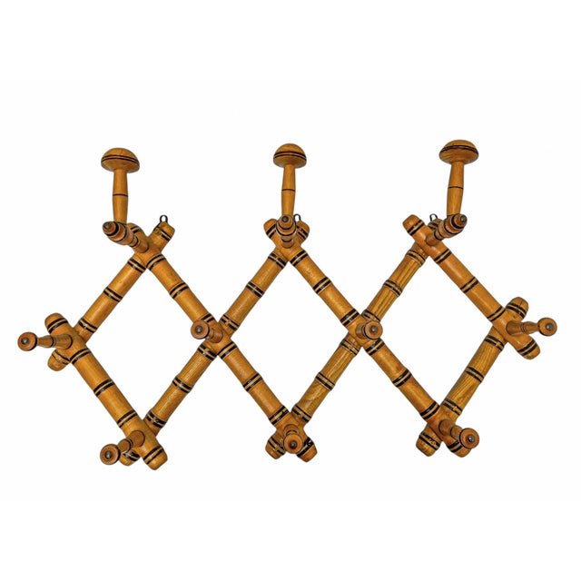 Antique Faux Bamboo Coat Rack made in France around 1920. This “harmonica” coat rack is practical and very decoratieve...