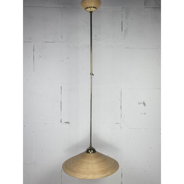 Lovely telescopic hanging pendant lamp from Italy 1970s. This gorgeous vintage lamp can be adjusted in height ( from 80 cm...