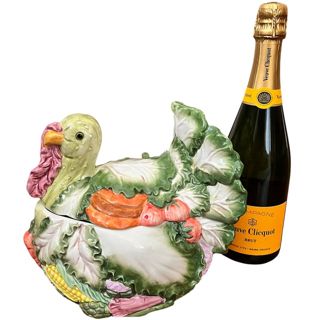 A wonderfully exuberant vintage majolica-style ceramic tureen modeled as a turkey nestled among a bounty of garden...
