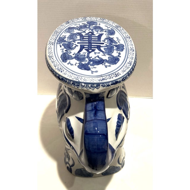 Whimsical blue and white chinoiserie elephant garden seat /plant stand. Circa 1980’s Measures 16” w x 8” d x14”h. Retailed...
