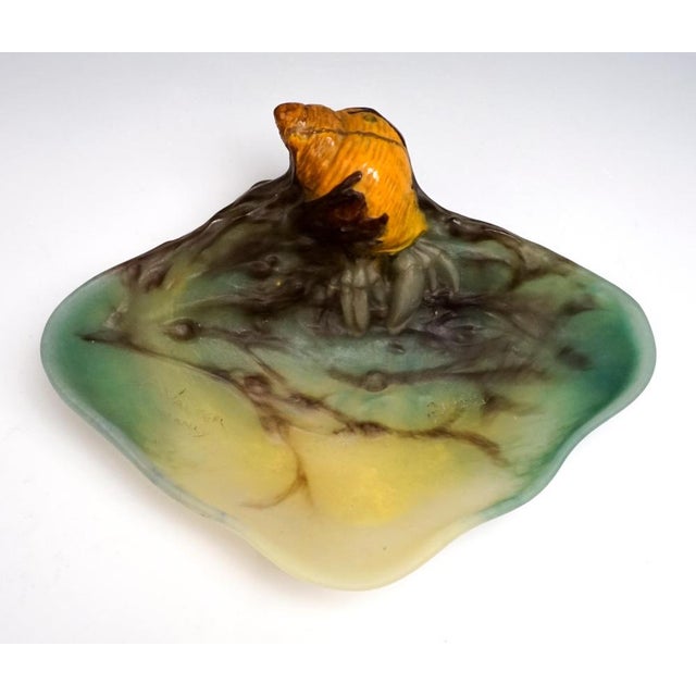 Large, diamond-shaped vide-poche from pâte de verre in sea green to light yellow, with brown meltings depicting branches,...