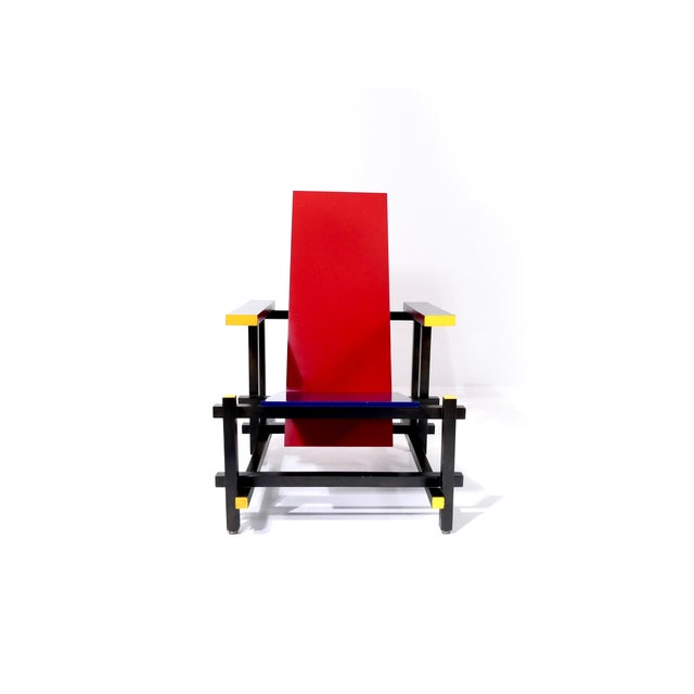 The "Red and Blue Chair" by Dutch cabinetmaker, designer, and architect Gerrit Rietveld (1888-1964) is one of the most...