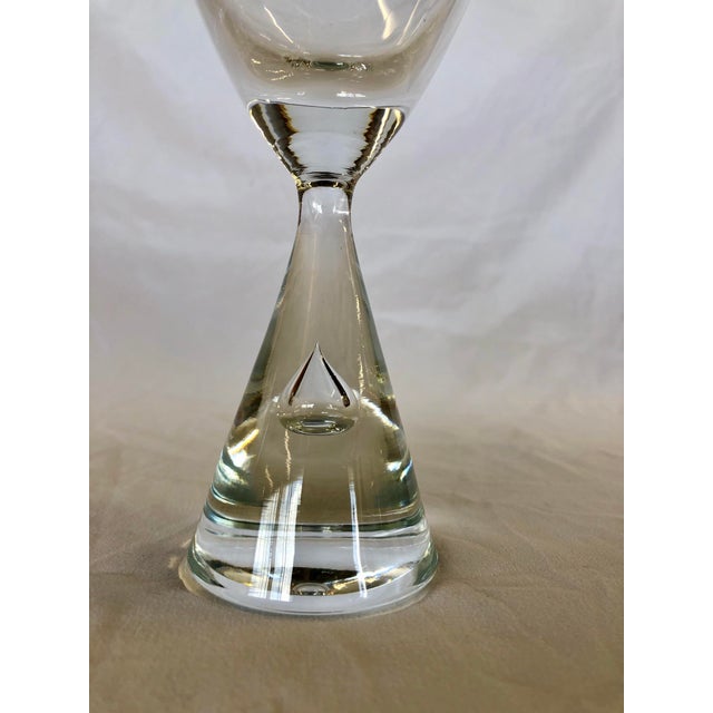 Wine/Water Princess glasses by Holmegaard. These are teardrop crystal glasses designed by Bent O. Severin in 1957. They’re...