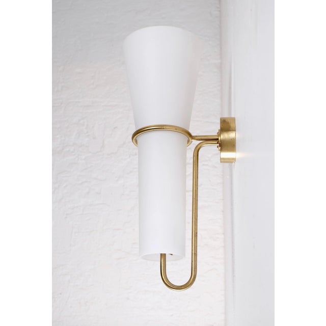 Rare set of 2 opaline glass wall lights produced and designed by Hans-Agne Jakobsson, Markaryd, Sweden, 1950s. Measures:...