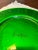 Green glass large plate celebrating the 100th anniversary of Neiman Marcus. It is 13.75 inches wide. The back side has a...