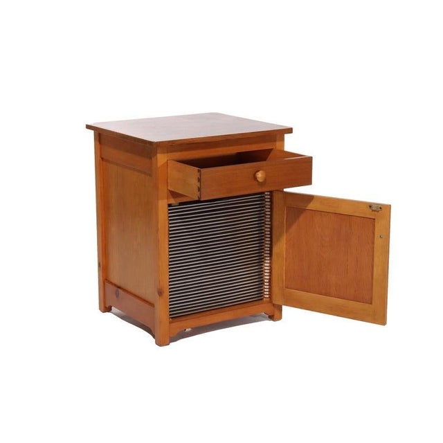 Antique Regional Mahogany Music Box Disk Cabinet with One Disk C1920 Measures - 29"H x 23"W x 21"D An antique mahogany...