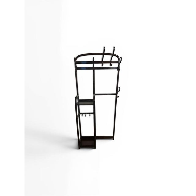Original Thonet wardrobe circa 1910 (No. 2633) Wood type: Bent beechwood Color: Dark mahogany Dimensions: Height: 193 cm...
