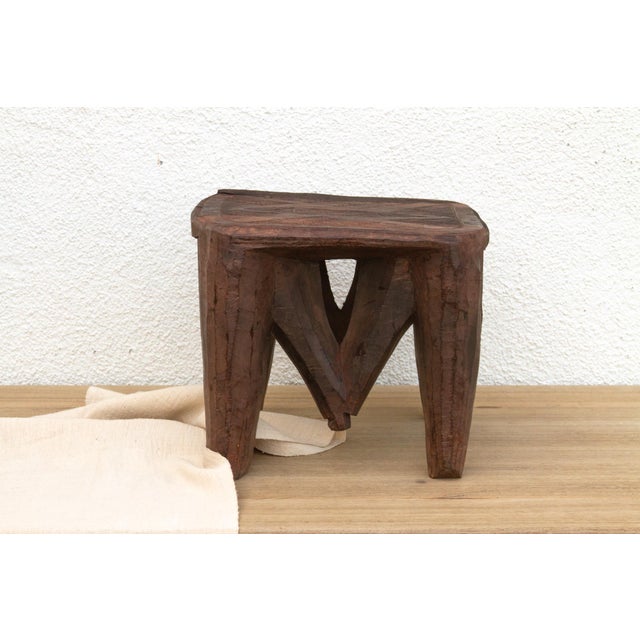 A unique piece of African art, this vintage Nupe table from Nigeria is a must-have for collectors and enthusiasts of Nupe...